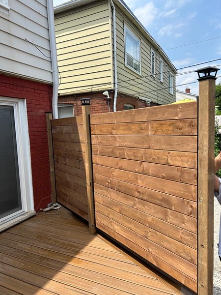 Horizontal wood fence installation, Toronto GTA