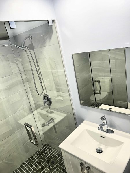 Bathroom upgrade with new fixtures and tiling GTA